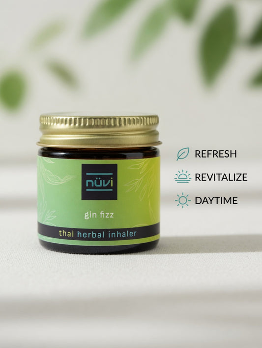 Person using Nuvi Gin Fizz herbal inhaler for a midday refresh